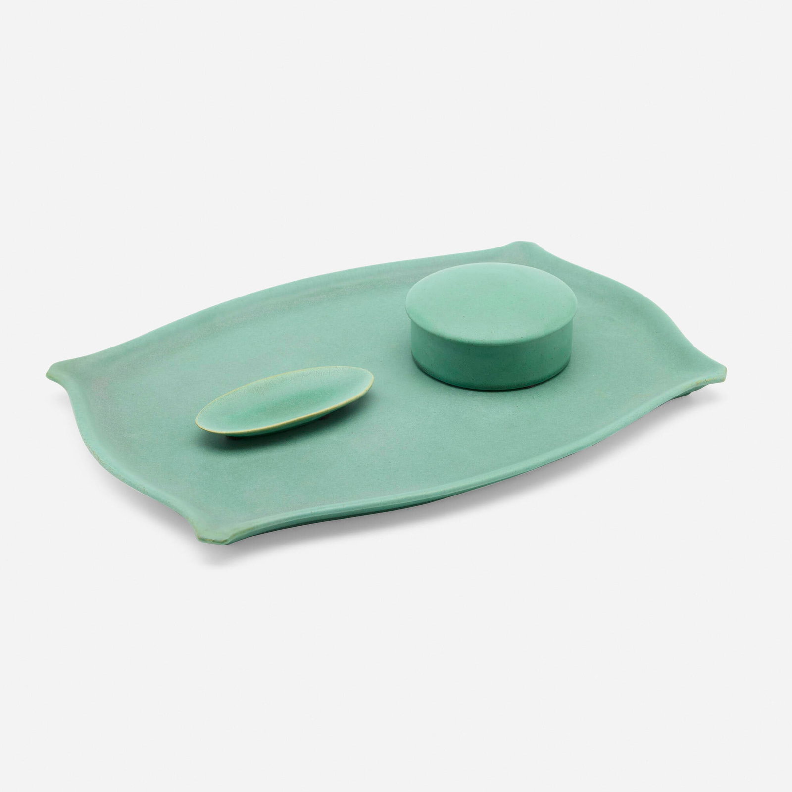 William Day Gates for Teco Pottery, Three-piece desk set: William Day Gates for Teco Pottery Three-piece desk set USA, c. 1904 glazed earthenware 0.75 h x 13 w x 9.75 d in (2 x 33 x 25 cm) 1.5 h x 4 dia in (4 x 10 cm) 0.5 h x 4.25 w x 2 d in (1 x 11 x 5 cm)