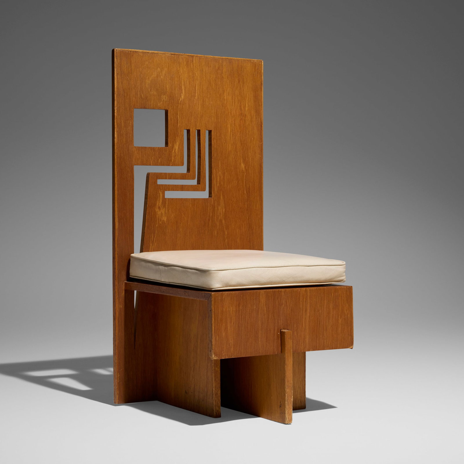 Frank Lloyd Wright, Chair from the Paul J. and Ida Trier House, Des Moines, Iowa: Frank Lloyd Wright Chair from the Paul J. and Ida Trier House, Des Moines, Iowa Plycraft Products USA, 1953 / 1956 mahogany laminate, leather 37.375 h x 18.5 w x 19.5 d in (95 x 47 x 50 cm) This