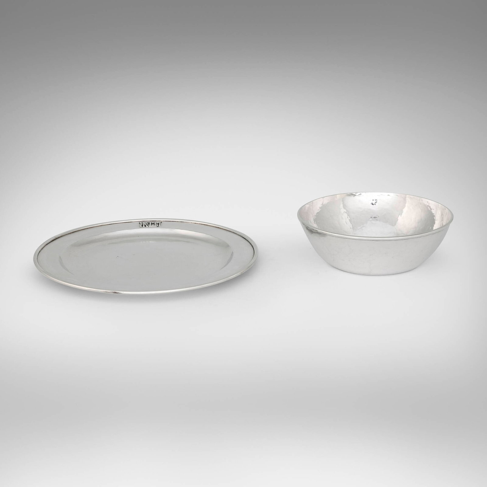 The Kalo Shop, Early bowl and plate: The Kalo Shop Early bowl and plate Park Ridge, USA, c. 1908-11 sterling silver 1.75 h x 5.5 dia in (4 x 14 cm) 0.5 h x 8 dia in (1 x 20 cm) Impressed manufacturer's mark to underside of