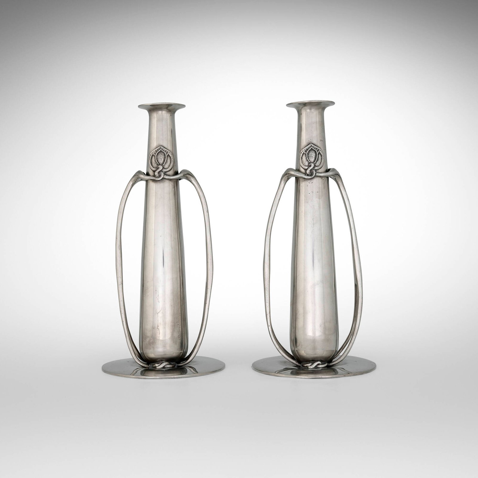 Archibald Knox, Tudric vases model 0212, pair: Archibald Knox Tudric vases model 0212, pair Liberty & Co. United Kingdom, c. 1903 pewter 14 h x 6.75 dia in (36 x 17 cm) Impressed manufacturer's mark and number to underside of each