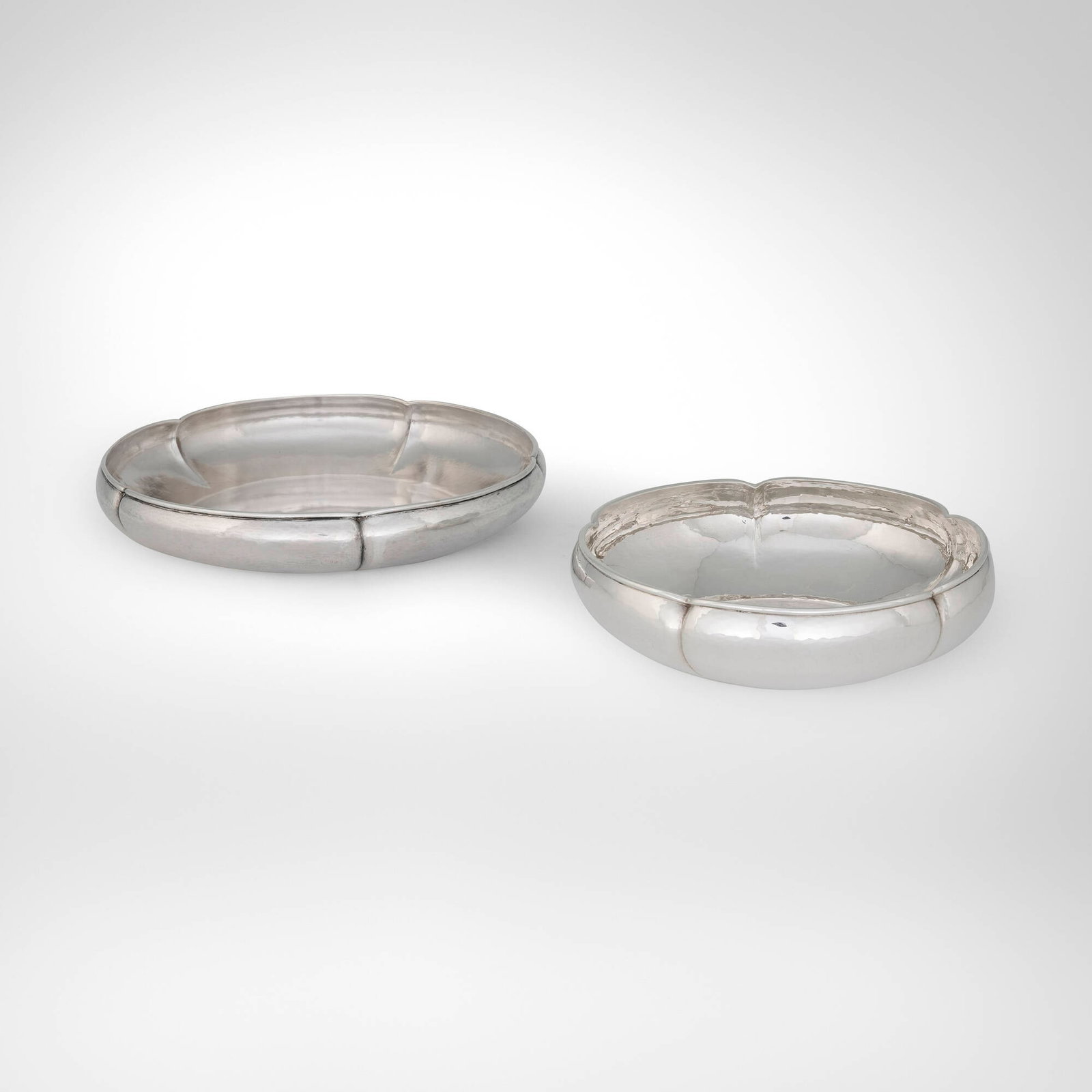 The Kalo Shop, Round lobed bowls, set of two: The Kalo Shop Round lobed bowls, set of two Chicago, USA, first half of the 20th century sterling silver 2 h x 7.75 dia in (5 x 20 cm) 1.75 h x 9.25 dia in (4 x 23 cm) Impressed manufacturer's