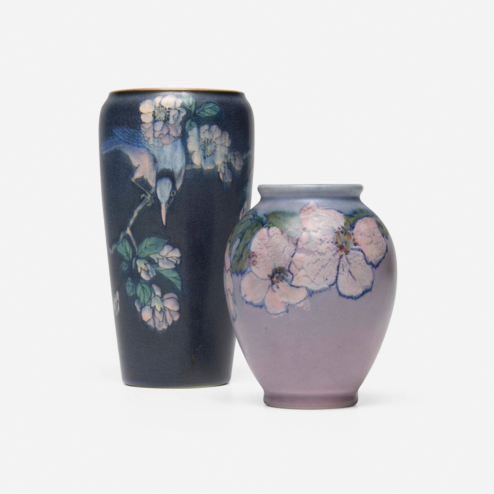 Rookwood Pottery, Vases, set of two: Rookwood Pottery Vases, set of two USA, 1906, 1929 glazed earthenware 7.5 h x 4 dia in (19 x 10 cm) 5.25 h x 4 dia in (13 x 10 cm) Set is comprised of a Vellum vase with bluebird on flowering branch
