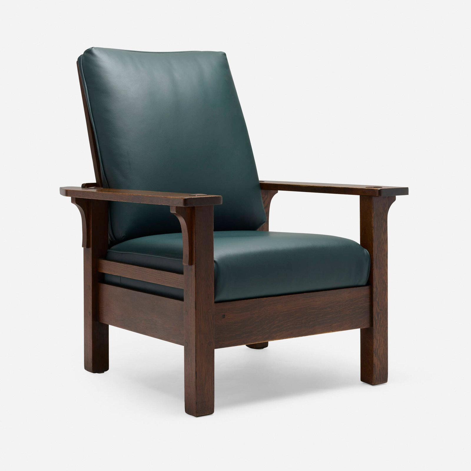 L. & J.G. Stickley, Fixed-back Morris chair, model 411: L. & J.G. Stickley Fixed-back Morris chair, model 411 USA, 1906-12 oak, leather 41 h x 32 w x 36 d in (104 x 81 x 91 cm) Decal manufacturer's label to underside of arm 'L. & J.G. Stickley