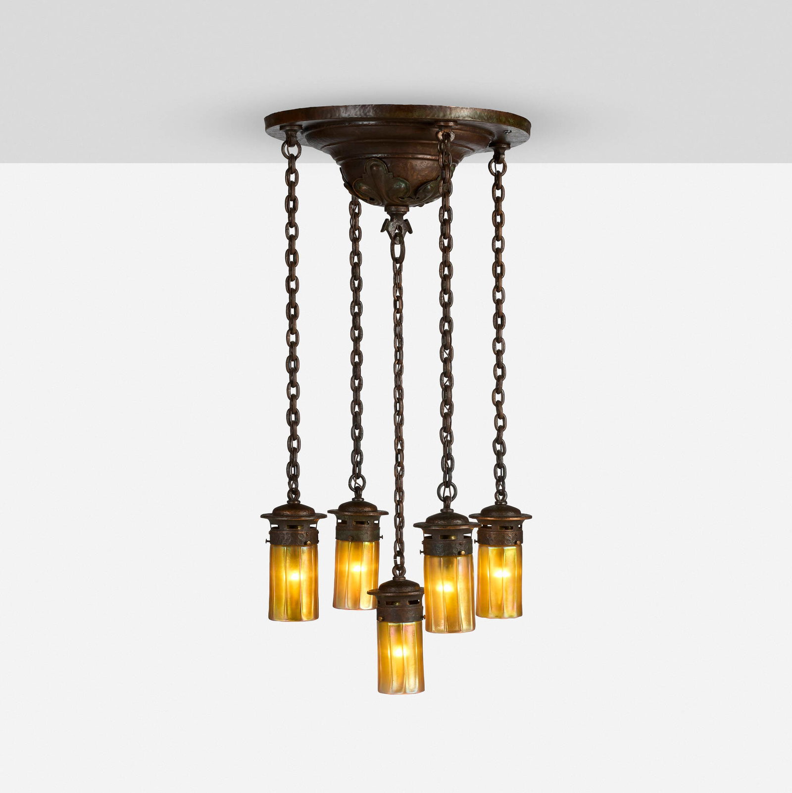 Arts & Crafts, Five-light chandelier with Steuben shades: Arts & Crafts Five-light chandelier with Steuben shades c. 1910 handwrought copper, Aurene glass 37 h x 19 dia in (94 x 48 cm) Acid-stamped manufacturer's mark to inner rim of three shades.