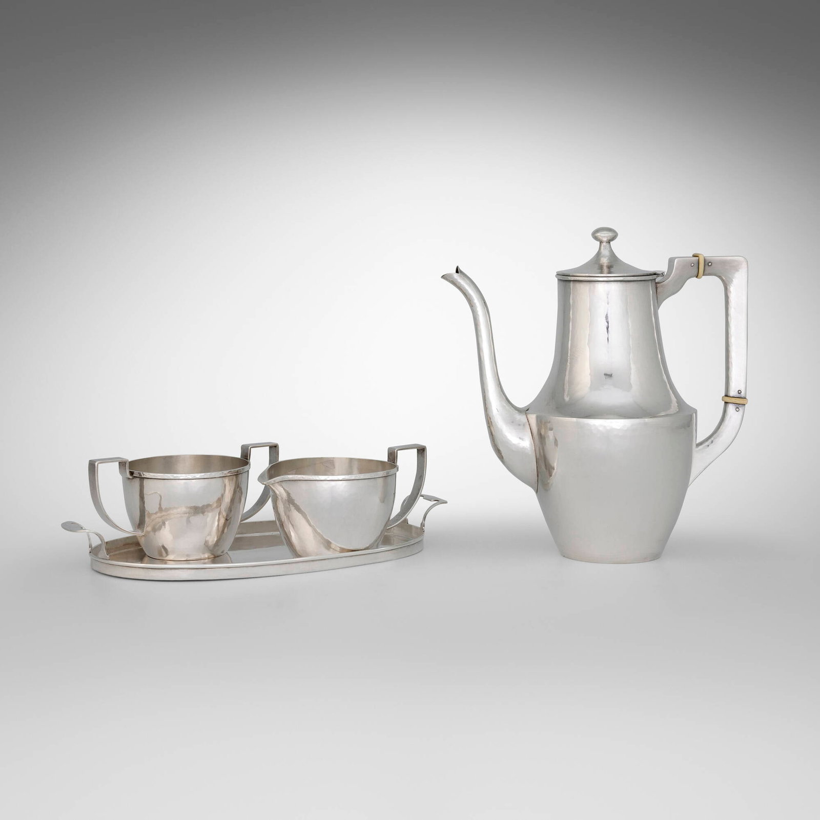 Bjarne Becker (B.B.) Andersen, Four-piece coffee service: Bjarne Becker (B.B.) Andersen Four-piece coffee service Norway/USA, c. 1910 sterling silver, bone largest: 8.5 h x 7.5 w x 4.5 d in (22 x 19 x 11 cm) smallest: 2.75 h x 5 w x 3.5 d in (7 x 13 x 9 cm)