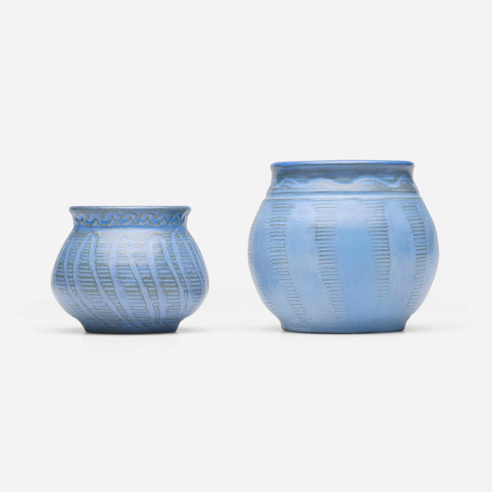 Arthur Eugene Baggs for Marblehead Pottery, Vases, set of two: Arthur Eugene Baggs for Marblehead Pottery Vases, set of two USA, 1908-1916 glazed and incised earthenware 3.75 h x 1.25 dia in (10 x 3 cm) 3 h x 3.5 dia in (8 x 9 cm) Impressed manufacturer's