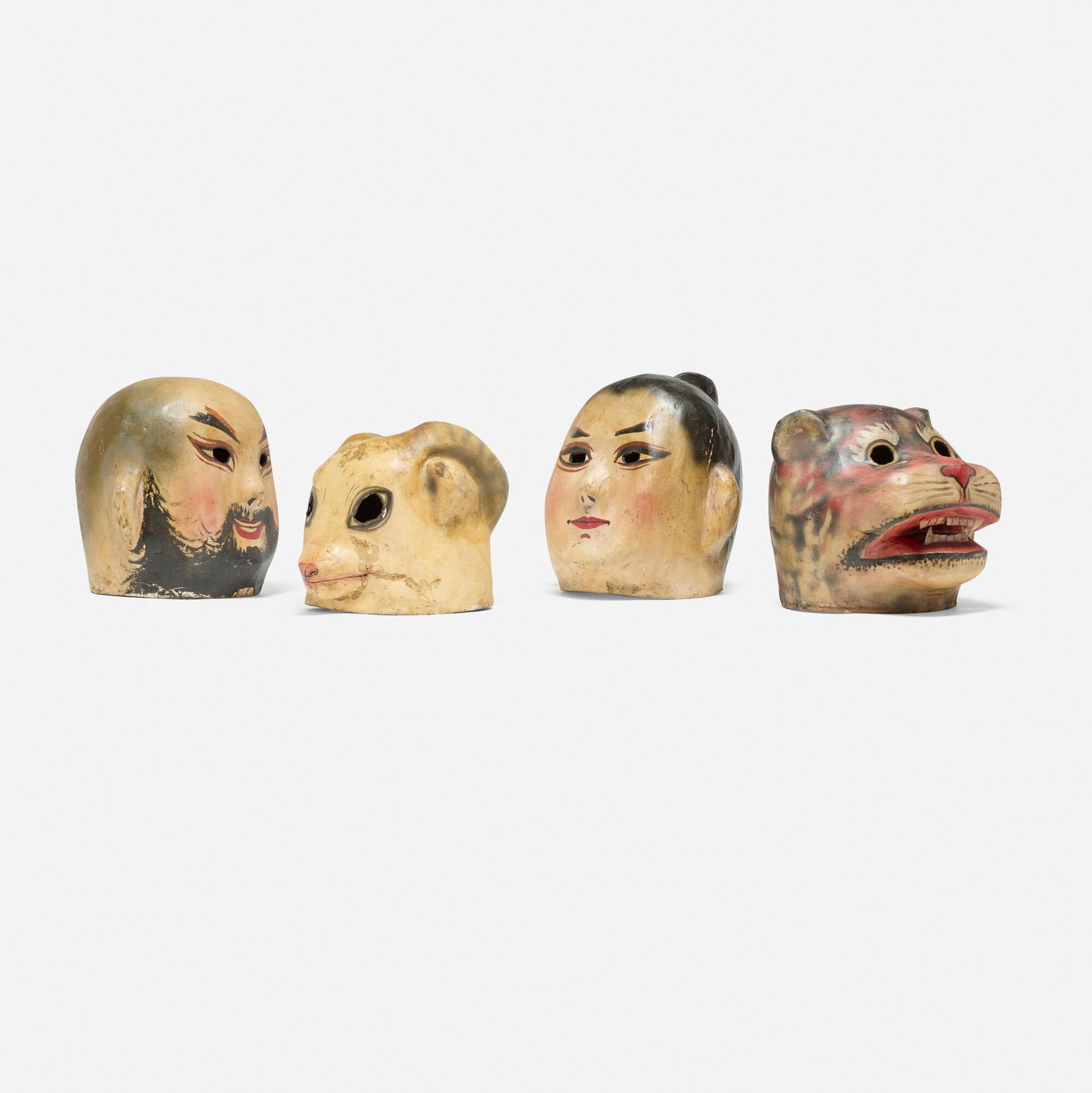 Tibetan, Collection of four religious ritual / theater masks: Tibetan Collection of four religious ritual / theater masks 20th century hand-painted papier-mache largest: 12.5 h x 12 w x 11 d in (32 x 30 x 28 cm) smallest: 11 h x 11.75 w x 12 d in (28 x 30 x 30