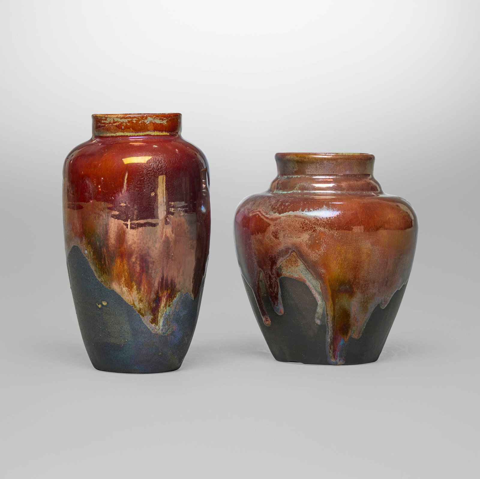 Ira and Ella Peters for Pewabic Pottery, Vases, set of two: Ira and Ella Peters for Pewabic Pottery Vases, set of two USA, 1977 iridescent-glazed earthenware 7 h x 4 dia in (18 x 10 cm) 6 h x 5.5 dia in (15 x 14 cm) Incised signatures and date to underside of