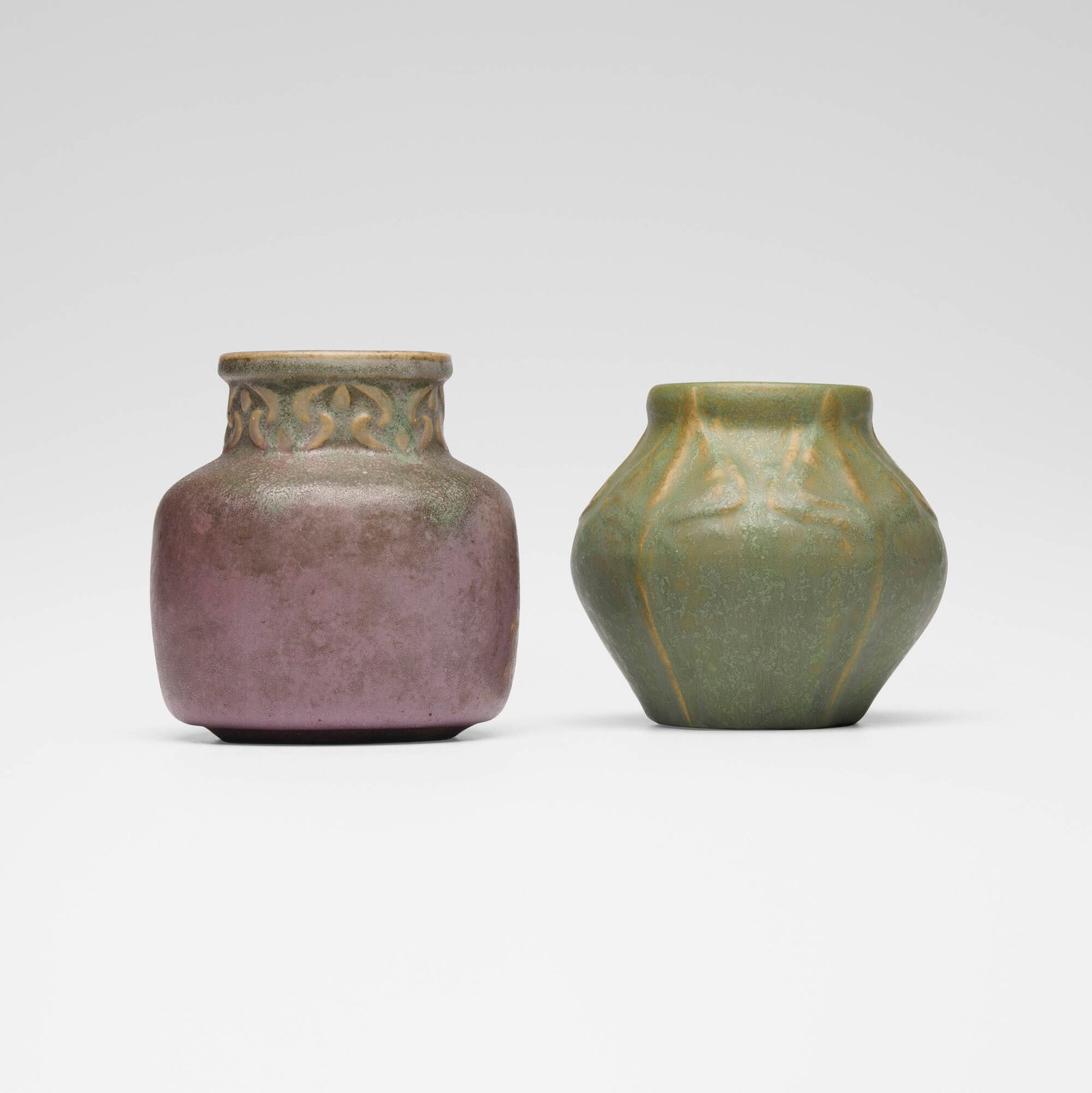 Van Briggle Pottery, Vases, set of two: Van Briggle Pottery Vases, set of two USA, c. 1907-12 glazed earthenware 4.75 h x 4.5 dia in (12 x 11 cm) 4.375 h x 4.875 dia in (11 x 12 cm) Incised manufacturer's mark and number to u