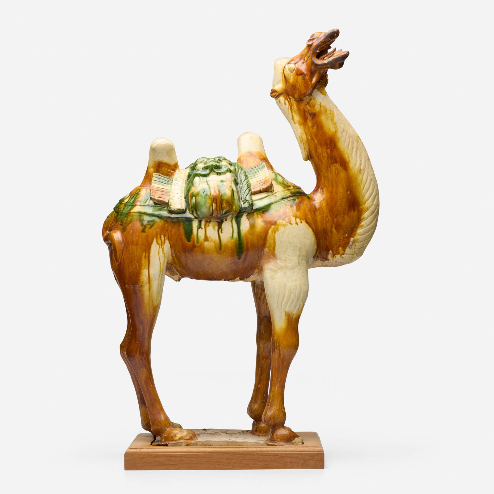 Chinese, Large Bactrian camel figure: Chinese Large Bactrian camel figure Tang dynasty (618-906 AD) sancai-glazed earthenware 27.5 h x 19 w x 8 d in (70 x 48 x 20 cm) Sold with a copy of the TL analysis report from Research Laboratory for