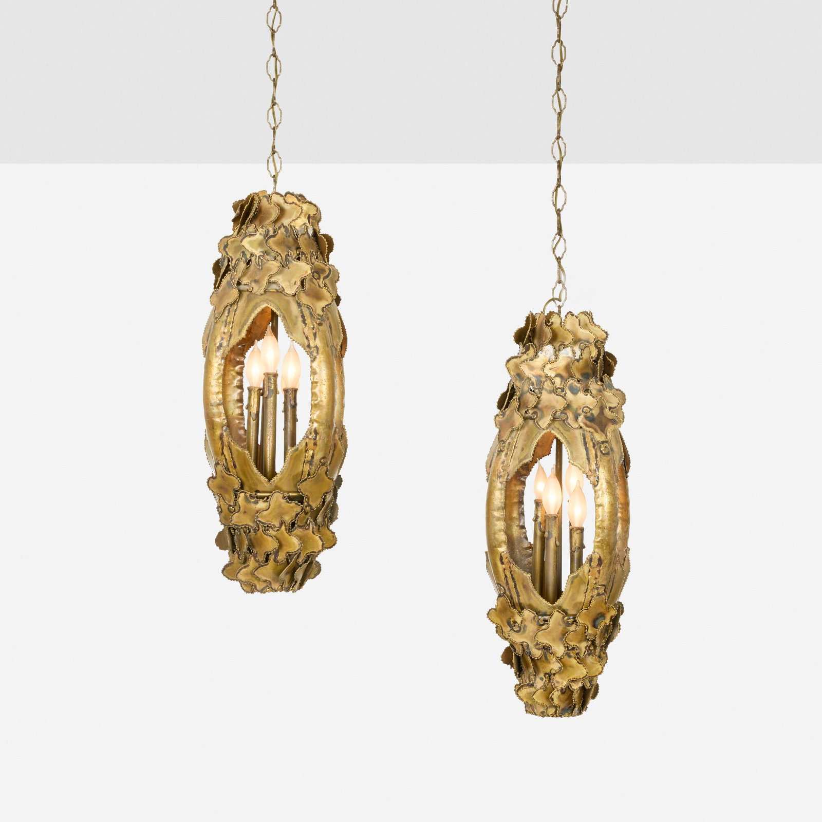 Tom Greene, Brutalist hanging lamps, pair: Tom Greene Brutalist hanging lamps, pair Feldman Lighting Company USA, c. 1965 brass, patinated steel 28 h x 12 dia in (71 x 30 cm) This work will ship from Los Angeles, California.