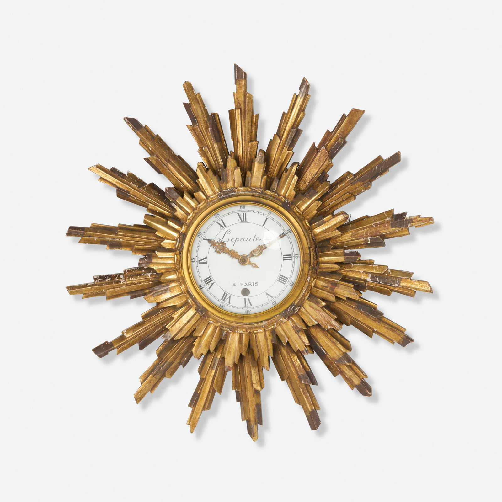 Lepaute, Sunburst wall clock: Lepaute Sunburst wall clock France, c. 1960 gilt wood, enameled steel, glass, brass 5 d x 20 dia in (13 x 51 cm) Enameled manufacturer's mark to clock face 'Lepaute a Paris'. This work