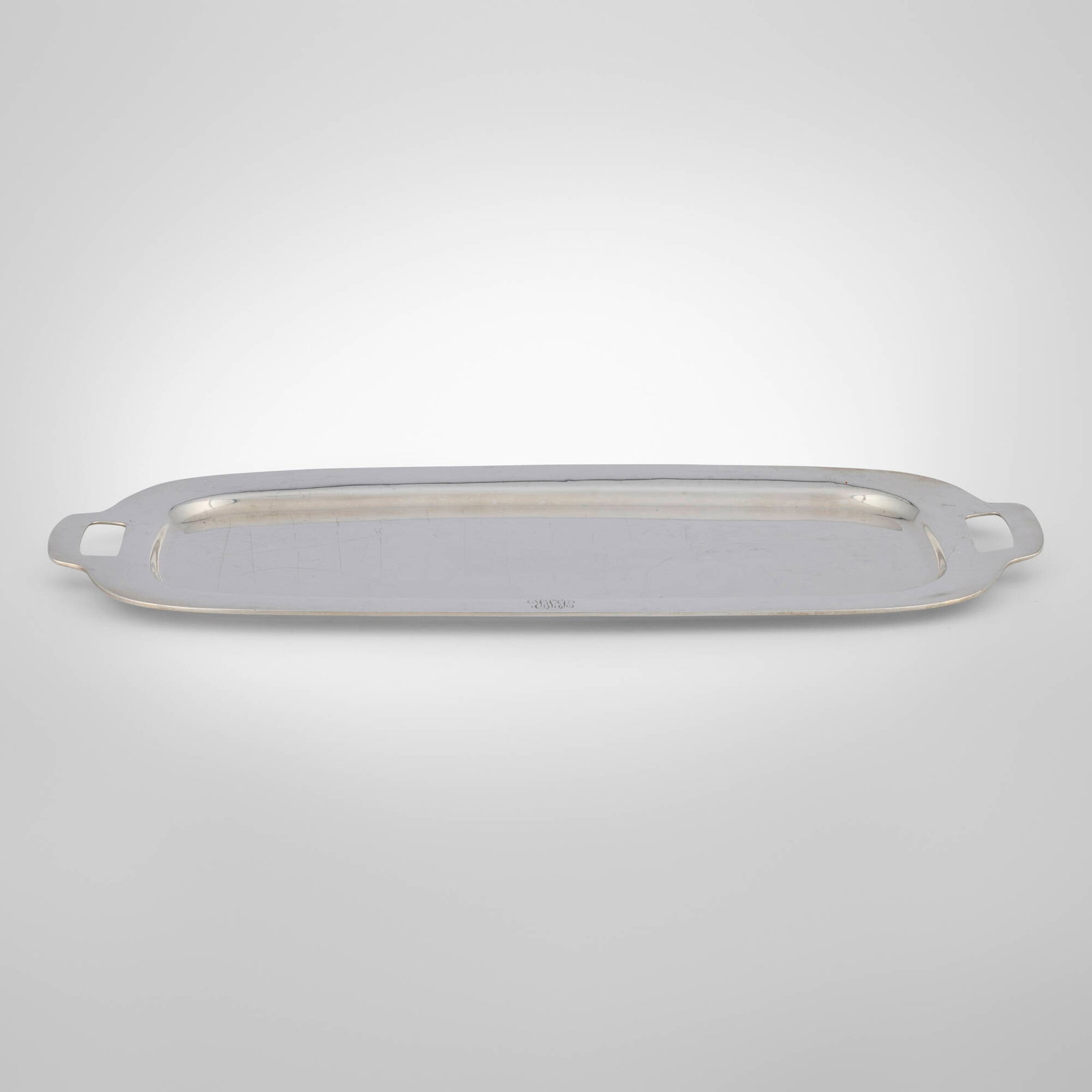 Frank W. Smith Silver Co., Serving tray: Frank W. Smith Silver Co. Serving tray Gardner, USA, first half of the 20th century sterling silver 0.5 h x 19.25 w x 9.375 d in (1 x 49 x 24 cm) Impressed manufacturer's logo to underside