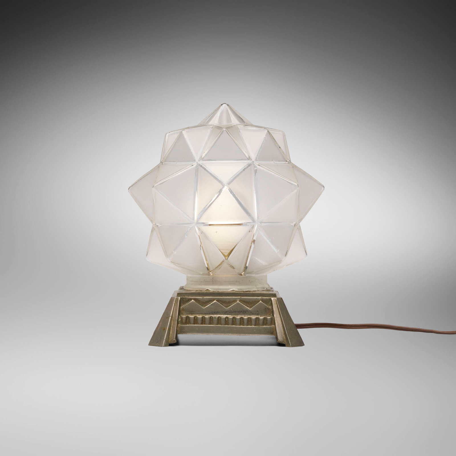 Art Deco, Geometric star table lamp: Art Deco Geometric star table lamp c. 1930 cast and acid-etched glass, nickel-plated bronze 8.5 h x 7 w x 7 d in (22 x 18 x 18 cm) This work will ship from Lambertville, New Jersey.