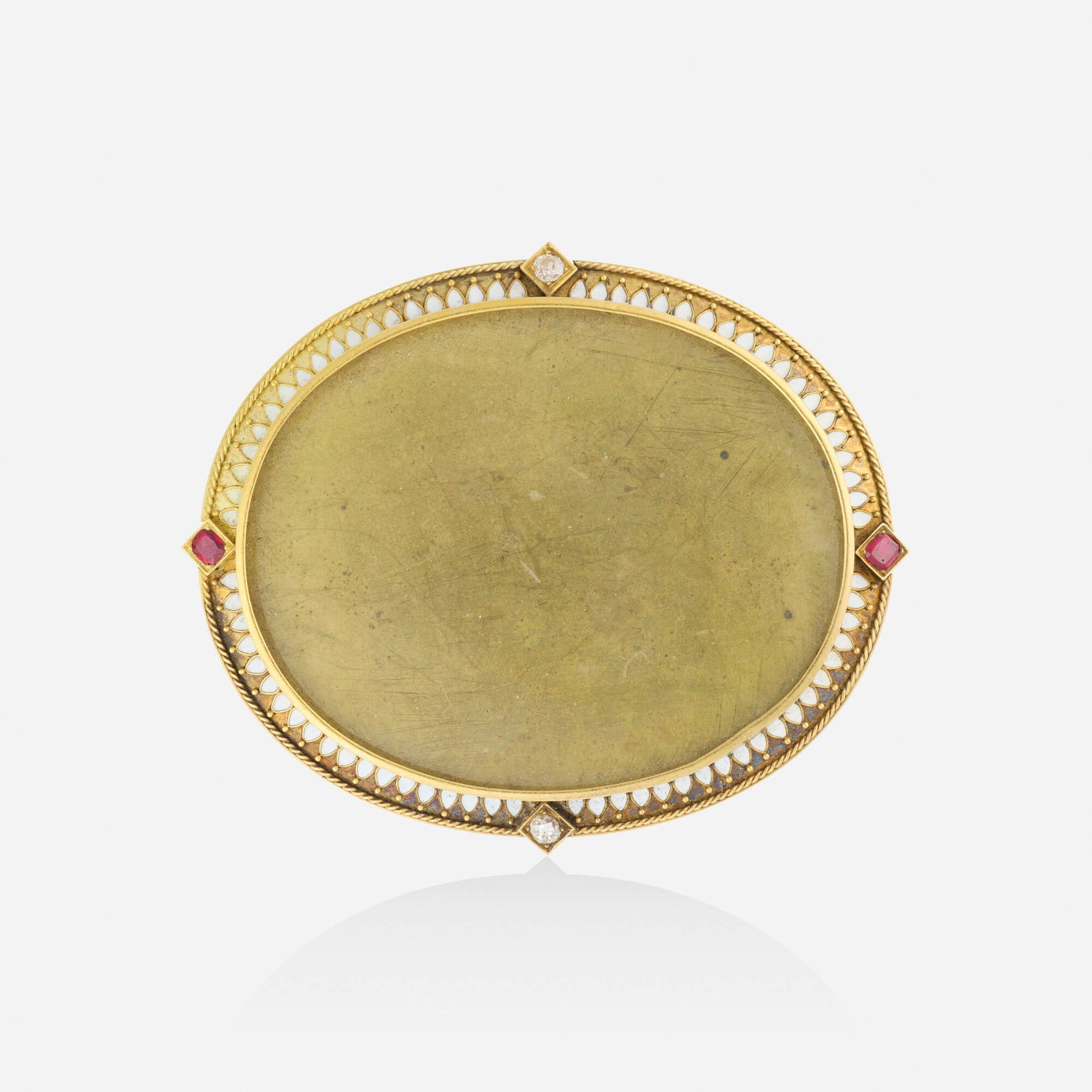 Etruscan Revival, Ruby, diamond, and gold brooch: Etruscan Revival Ruby, diamond, and gold brooch Framed with white enamel, oval-cut rubies, old mine-cut diamonds and roped gold Yellow gold 2.875 x 2.375 in; Gross weight 34.0 dwts This work will