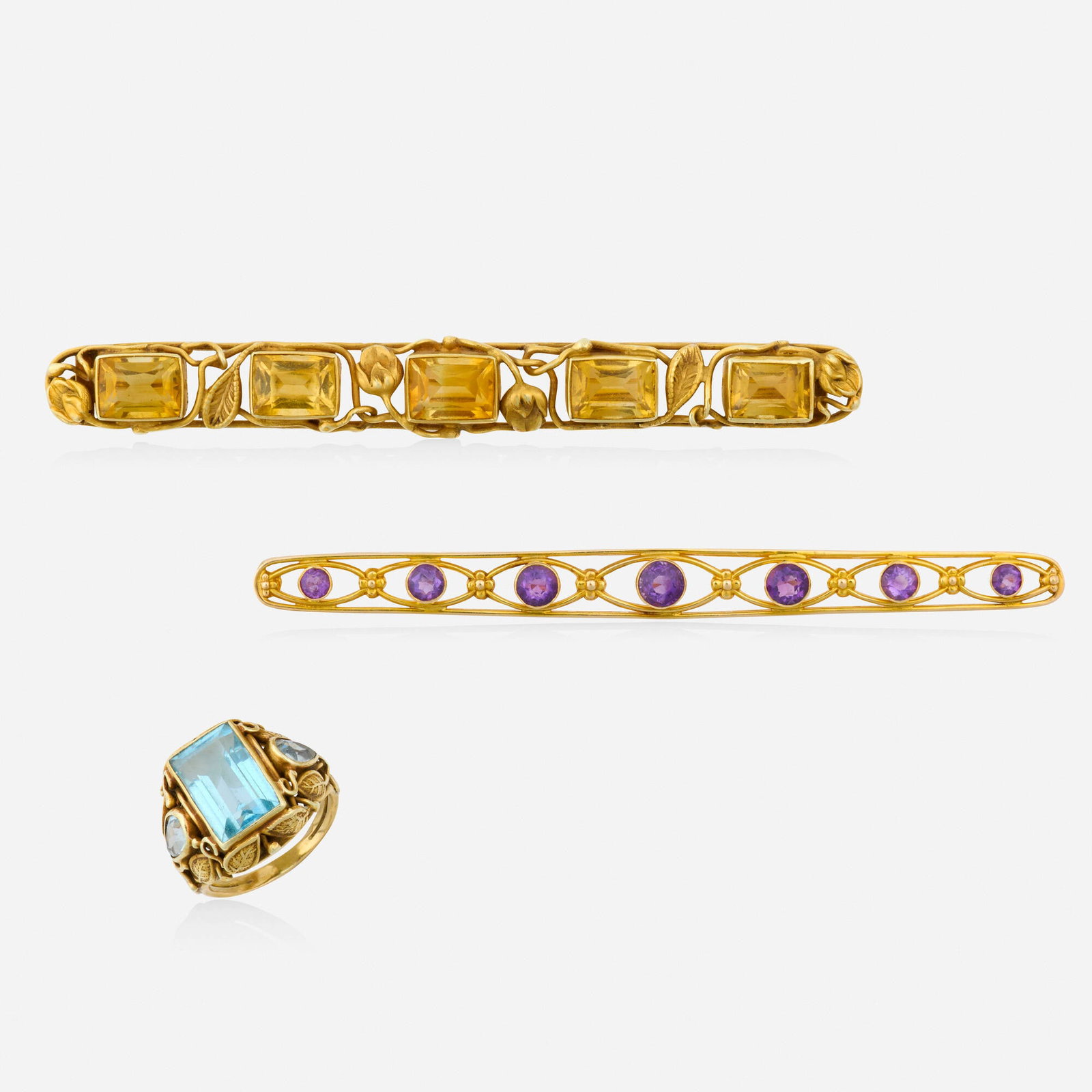Art Nouveau, Group of multi-gem and gold jewelry: Art Nouveau Group of multi-gem and gold jewelry Each of foliate design, comprising a brooch set with rectangular-cut citrines; a brooch set with circular-cut amethysts; and a ring set with pear and re