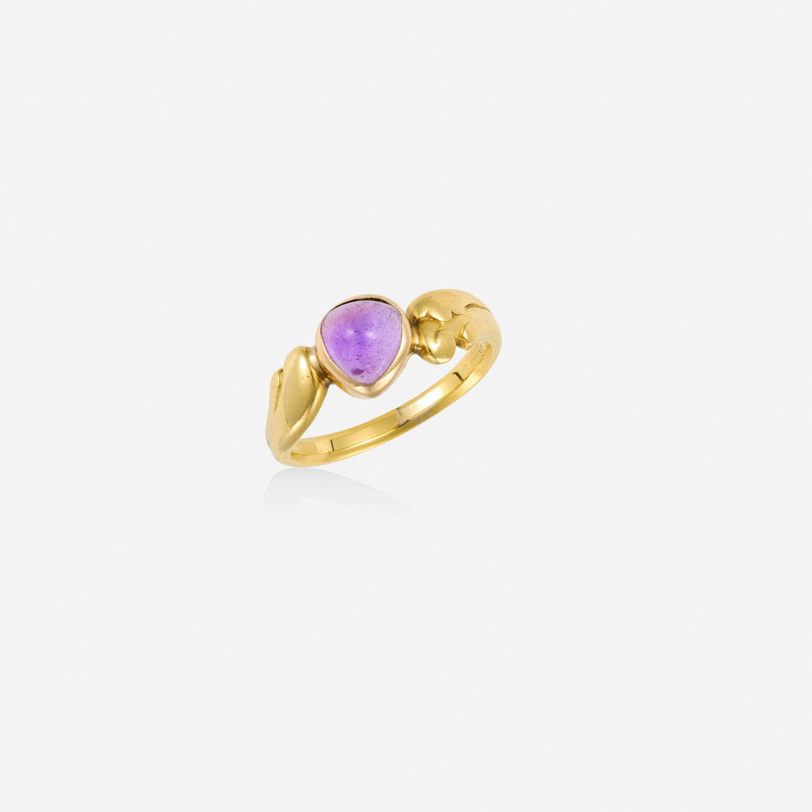 Tiffany & Co., Art Nouveau amethyst and gold ring: Tiffany & Co. Art Nouveau amethyst and gold ring Set with a cabochon amethyst Yellow gold Signed Tiffany & Co. Ring size 6.50; Gross weight 2.6 dwts Provenance: Collection of Mary Klassen and Mark