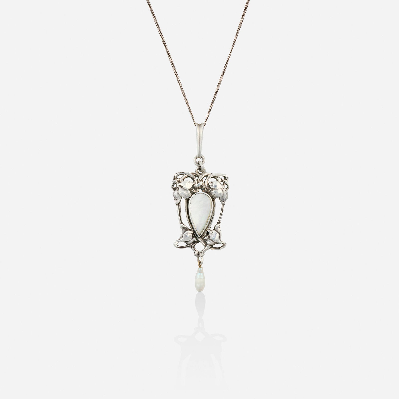 Joseph Anton Hodel, Arts & Crafts pearl and silver necklace: Joseph Anton Hodel Arts & Crafts pearl and silver necklace The foliate pendant set with mother-of-pearl and a hanging freshwater pearl, suspended from the fine-ink chain Silver Necklace 16.25 in, pend