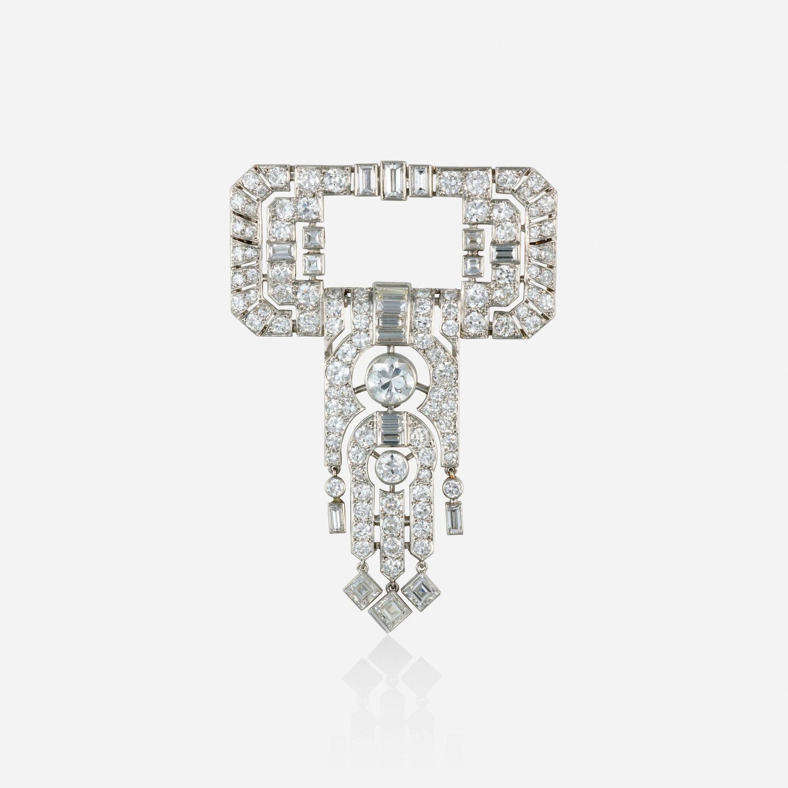 Art Deco, Diamond and platinum brooch: Art Deco Diamond and platinum brooch Of geometric design, set with old European, baguette, square, and single-cut diamonds Platinum 2.50 x 1.75 in; Gross weight 14.5 dwts This work will ship from Lamb