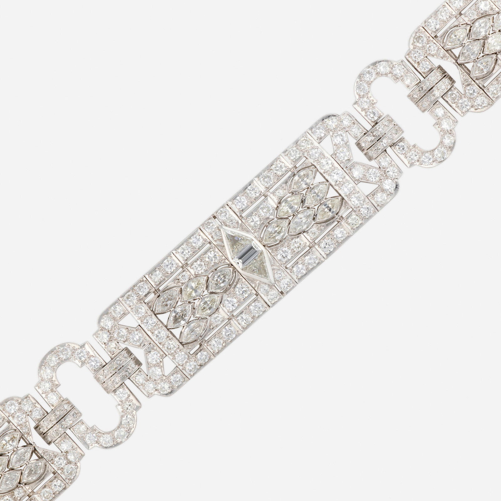 Art Deco, Diamond and platinum bracelet: Art Deco Diamond and platinum bracelet Of geometric design, set with triangular, baguette, marquise, old European, and single-cut diamonds Platinum 6.50 x 0.875 in; Gross weight 39.0 dwts This work wi