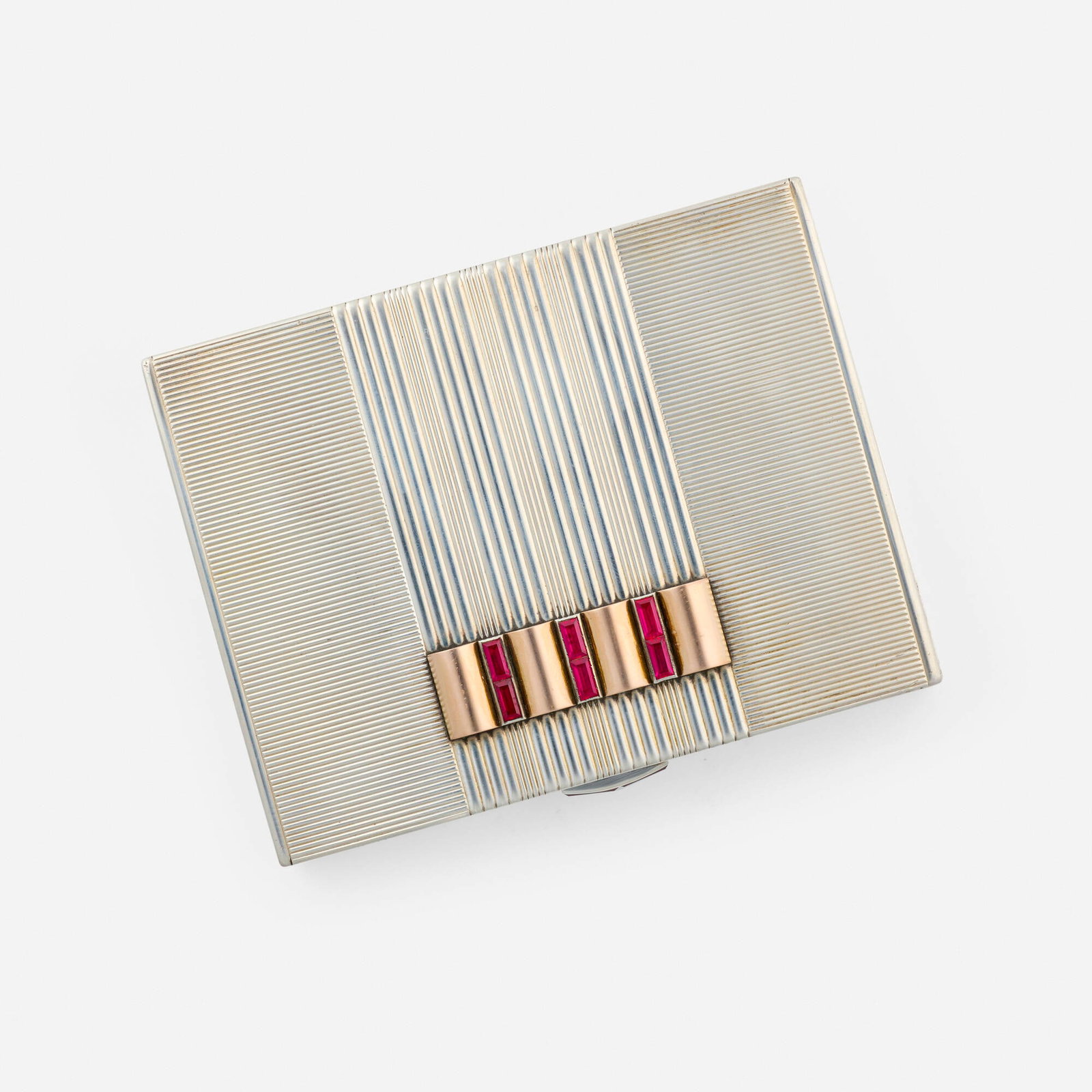 Zundel Lipec, Art Deco silver and synthetic ruby minaudiere: Zundel Lipec Art Deco silver and synthetic ruby minaudiere The case and clasp set with rectangular-cut synthetic rubies, opens to mirror, cosmetic compartments, lipstick holder, and comb Silver parcel