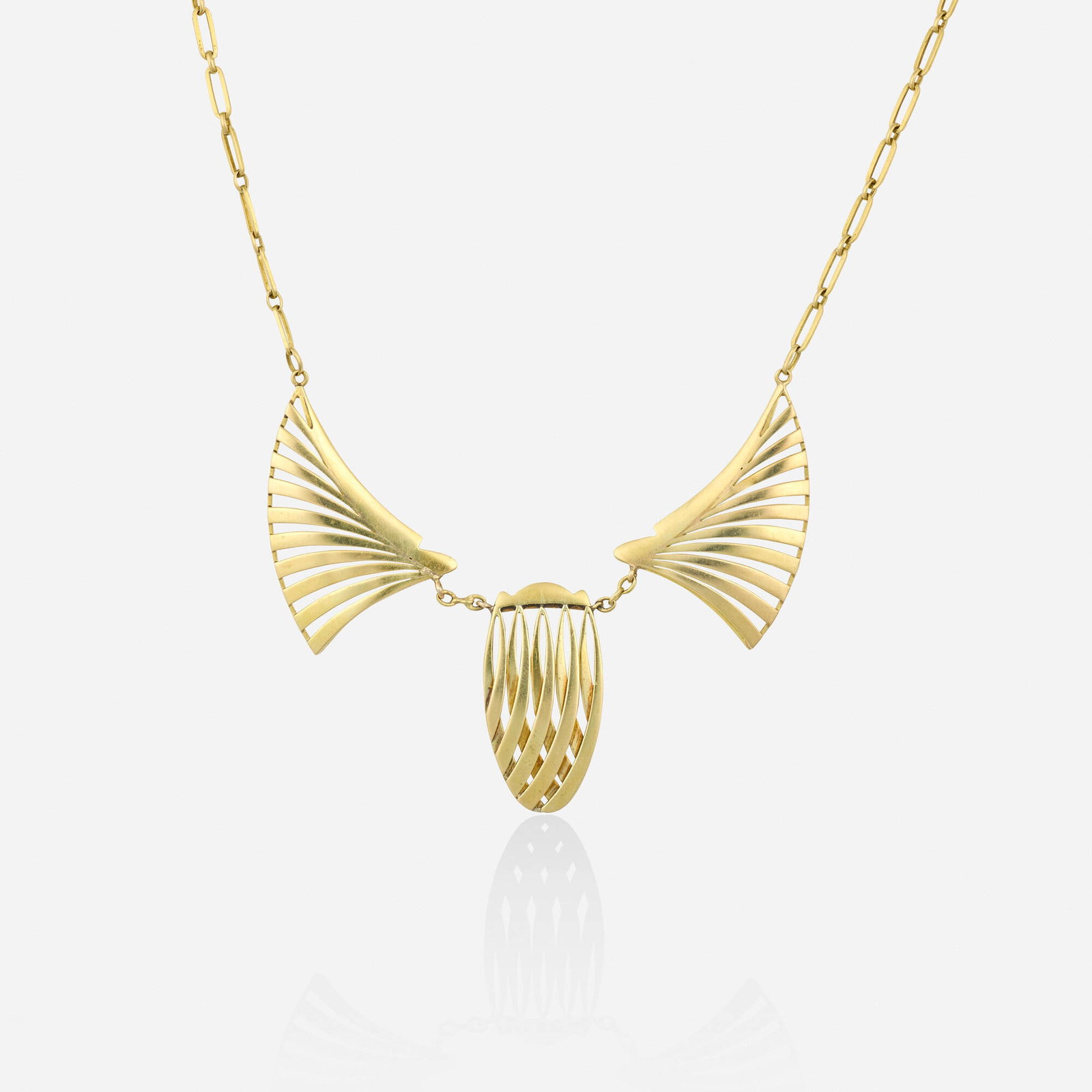 Art Deco / Egyptian Revival, French gold necklace: Art Deco / Egyptian Revival French gold necklace Designed as a stylized scarab 18k yellow gold 17 in; Gross weight 8.1 dwts Provenance: Collection of Mary Klassen and Mark Szyndrowski, Illinois