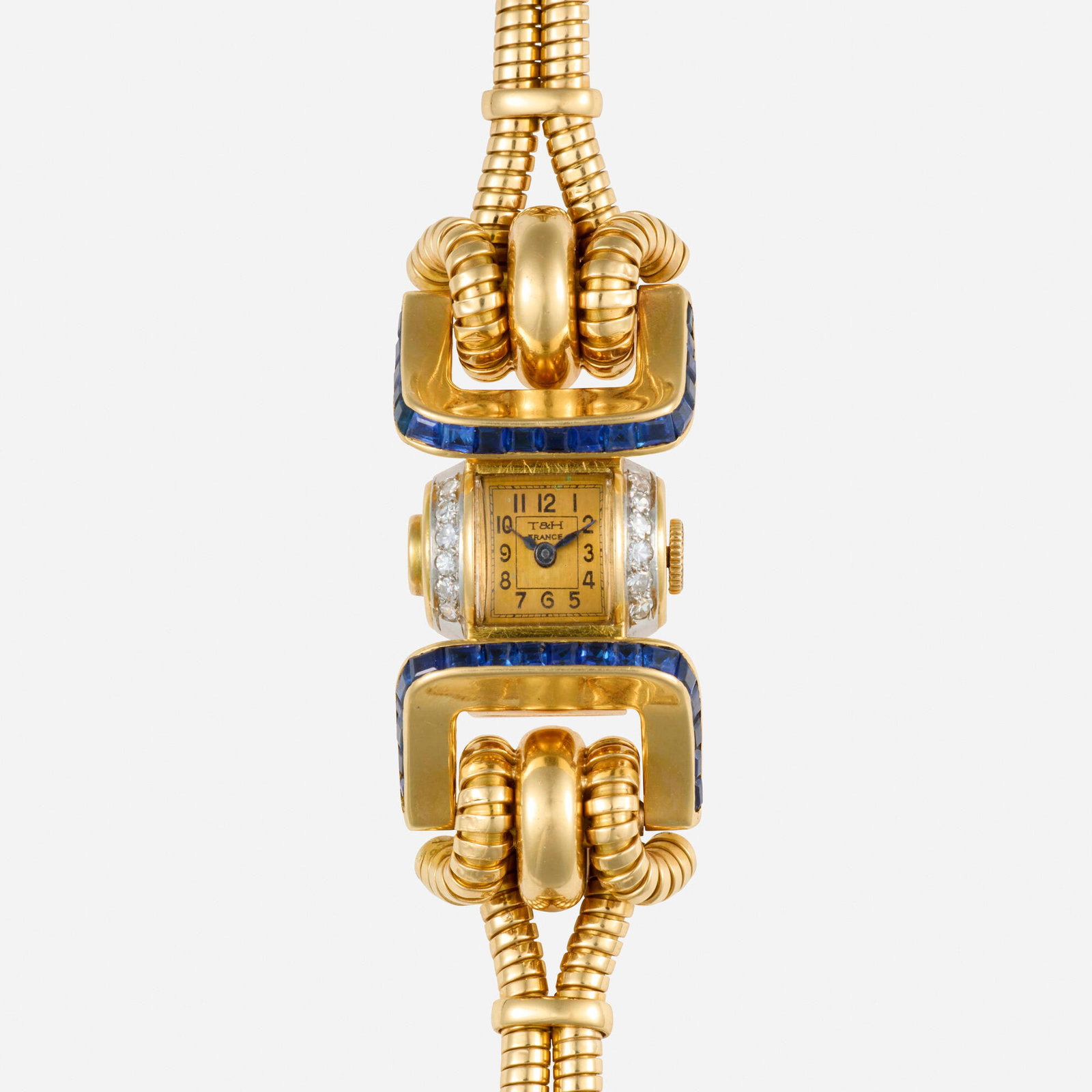 Trabert & Hoeffer-Mauboussin, Retro sapphire, diamond, and pink gold wristwatch: Trabert & Hoeffer-Mauboussin Retro sapphire, diamond, and pink gold wristwatch With Arabic hours, the case set with single-cut diamonds and calibre-cut sapphires Dial: Gold tone Movement: Manual wind