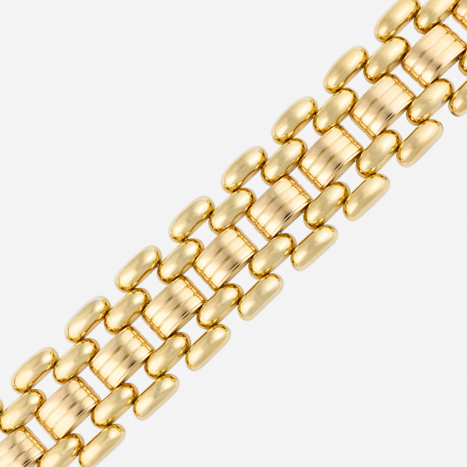 Retro, Bicolor gold bracelet: Retro Bicolor gold bracelet Of tank tread links 18k yellow and pink gold 8.375 x 1.50 in; Gross weight 108.8 dwts This work will ship from Lambertville, New Jersey.