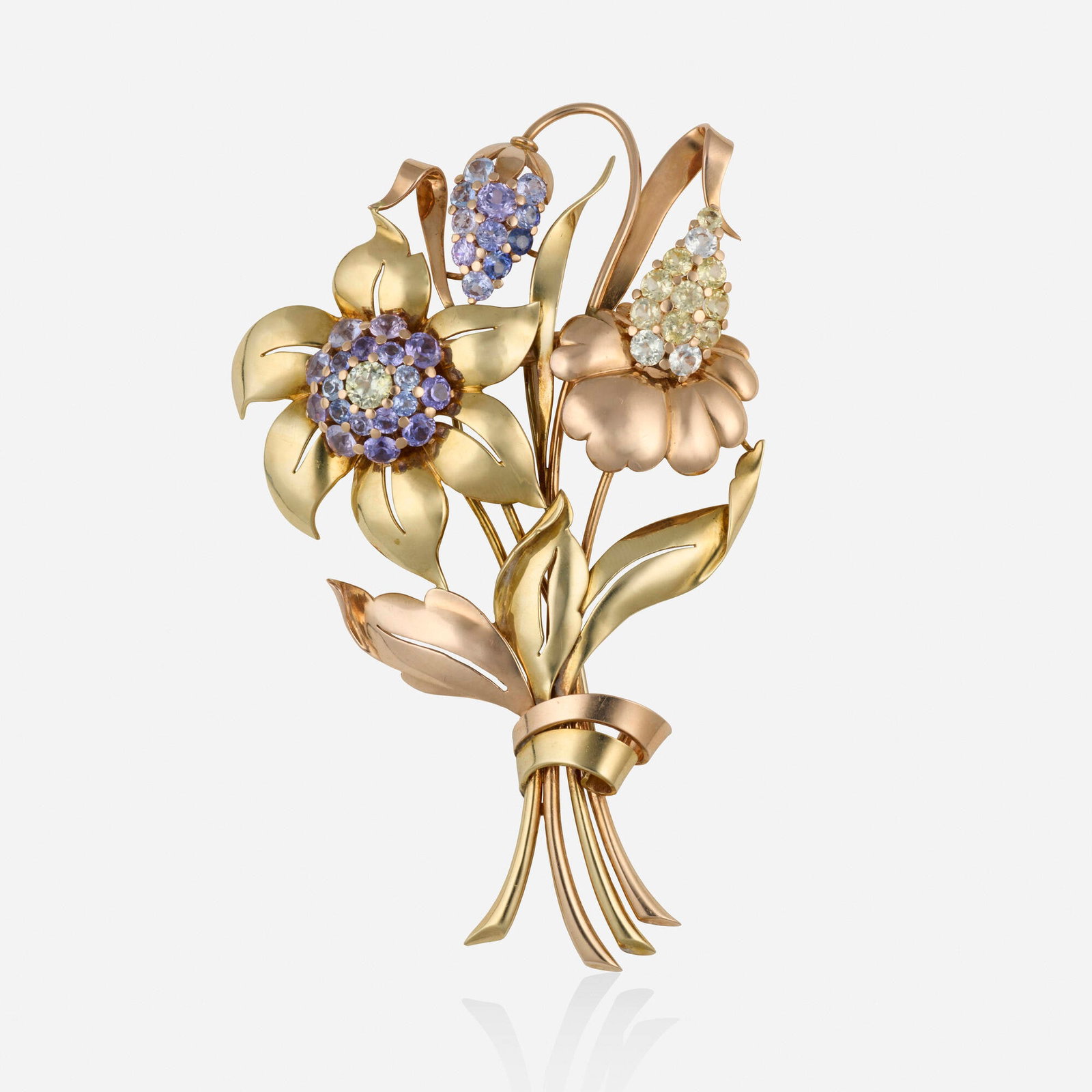 Retro, Fancy-color sapphire and tricolor gold brooch: Retro Fancy-color sapphire and tricolor gold brooch Of bouquet design, set with circular-cut violetish blue, yellow, and colorless sapphires 14k yellow, pink, and white gold 4.25 x 2.625 in; Gross