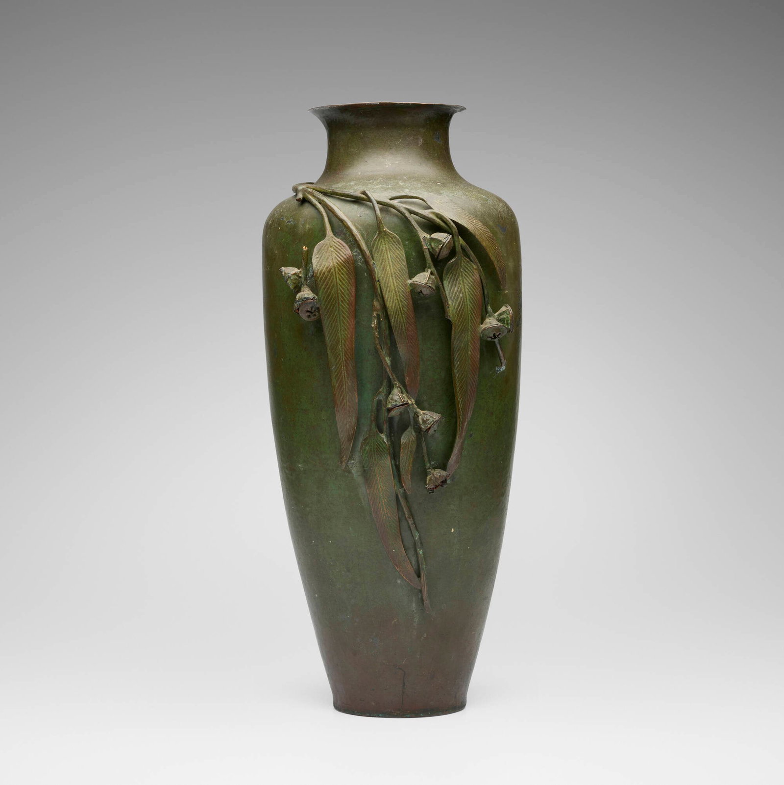 Fred Brosi for Ye Olde Copper Shoppe, Important vase with eucalyptus branch: Fred Brosi for Ye Olde Copper Shoppe Important vase with eucalyptus branch USA, 1917-1922 patinated copper 17.75 h x 8 dia in (45 x 20 cm) Impressed manufacturer's mark to underside 'Hand