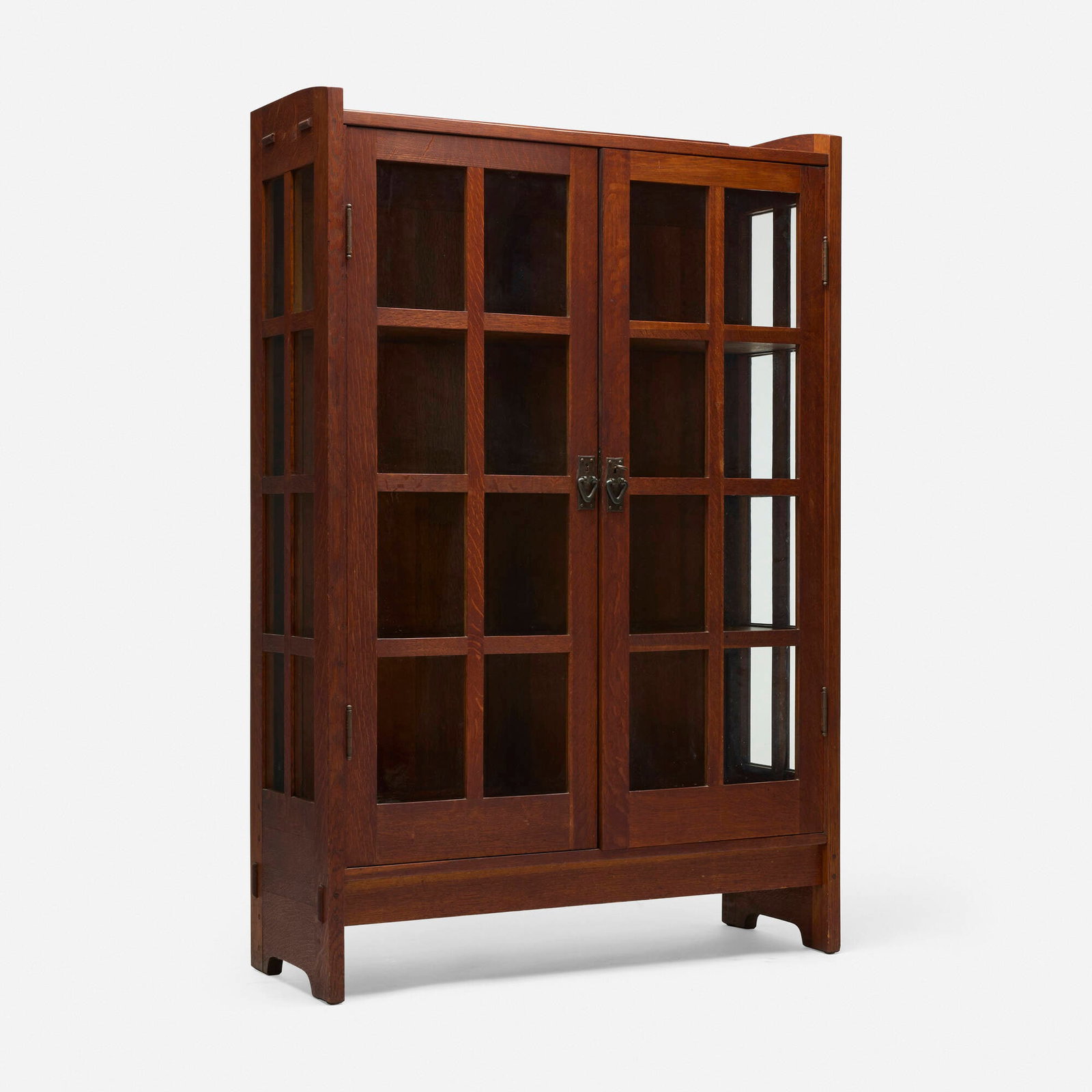 Gustav Stickley, China cabinet, model 815: Gustav Stickley China cabinet, model 815 USA, c. 1912-16 oak, glass, brass 63.5 h x 42 w x 15.5 d in (161 x 107 x 39 cm) China cabinet features two doors concealing three fixed shelves and storage.
