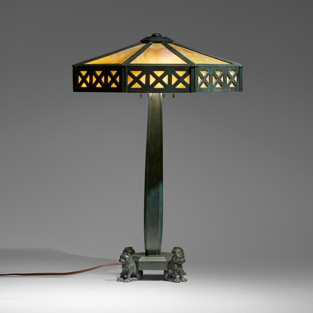 Wilkinson Co., Early table lamp with lions: Wilkinson Co. Early table lamp with lions USA, c. 1910 patinated bronze, glass 27 h x 19 w x 19 d in (69 x 48 x 48 cm) Impressed number to underside of base '501'. Literature: Mosaic Shades: Volume