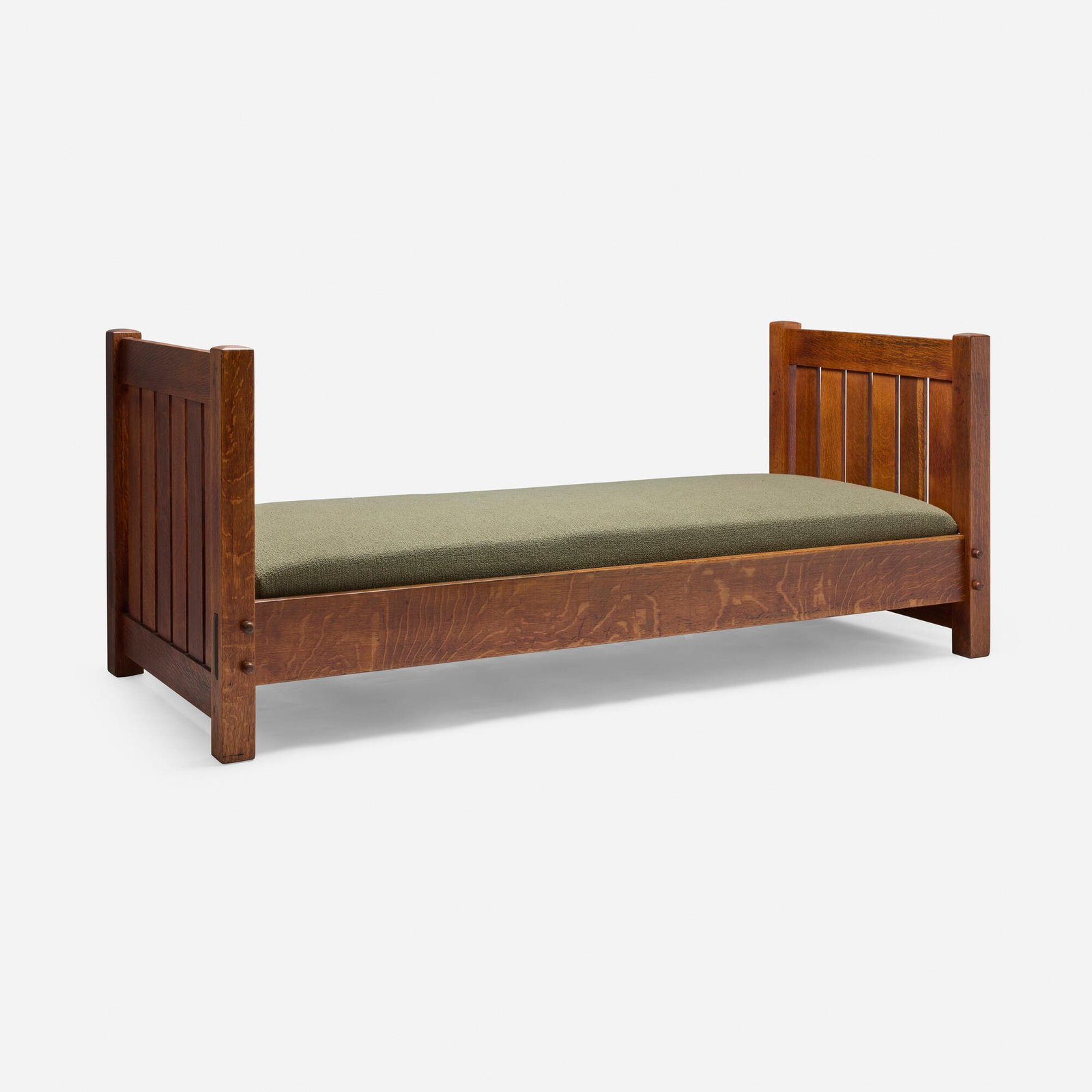 Gustav Stickley, Knock-down daybed, model 220: Gustav Stickley Knock-down daybed, model 220 USA, c. 1910 oak, upholstery 34 h x 83.25 w x 37.5 d in (86 x 211 x 95 cm) Partial paper manufacturer's label to interior 'Craftsman