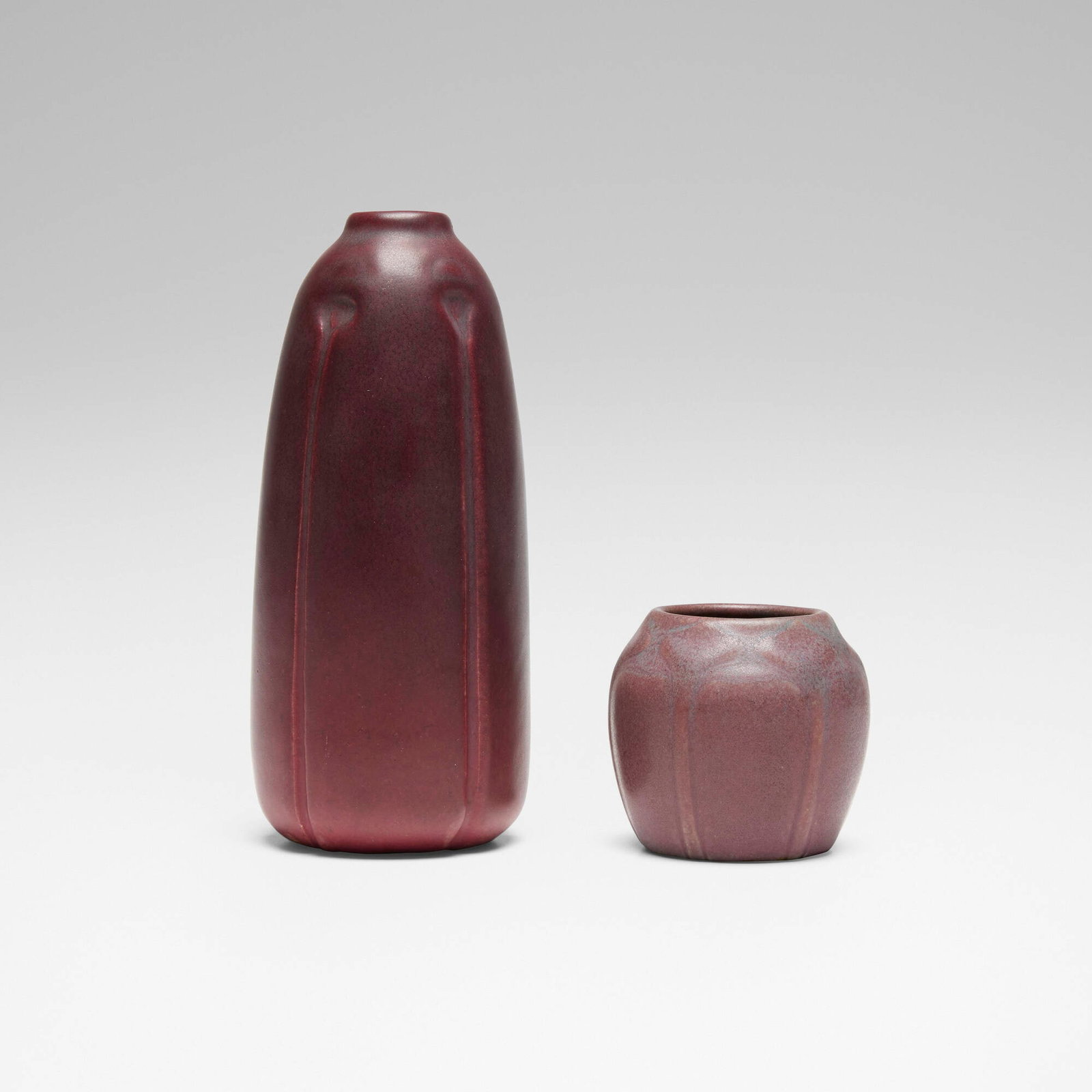 Van Briggle Pottery, Vases, set of two: Van Briggle Pottery Vases, set of two USA, 1911, 1918 glazed earthenware 6.25 h x 2.5 dia in (16 x 6 cm) 2.25 h x 2.25 dia in (6 x 6 cm) Incised manufacturer's mark and date to underside of each