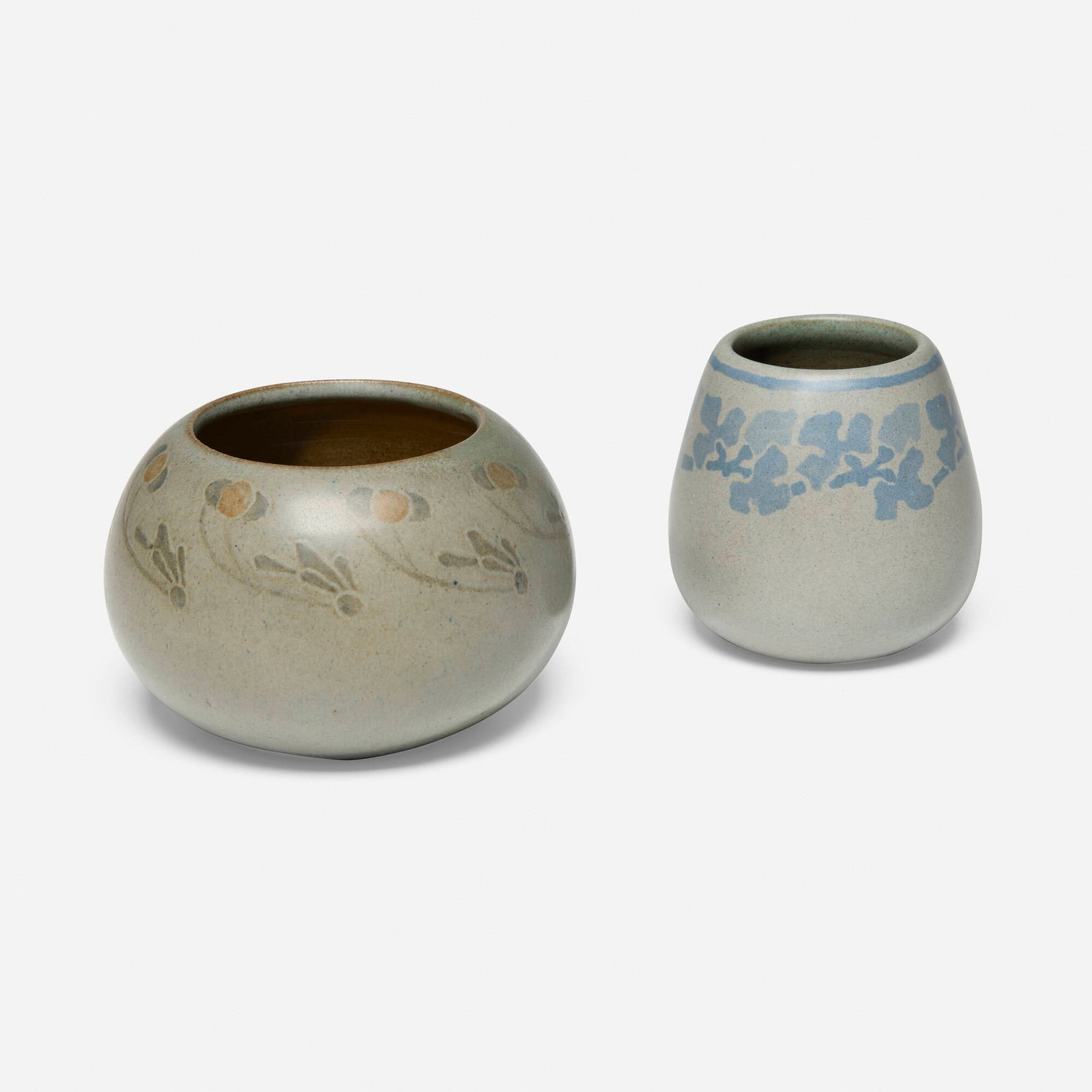 Marblehead Pottery, Decorated vases, set of two: Marblehead Pottery Decorated vases, set of two USA, c. 1908 glazed earthenware 3.25 h x 4.75 dia in (8 x 12 cm) 3.5 h x 3.5 dia in (9 x 9 cm) Set comprises a squat vase with conventionalized flowers