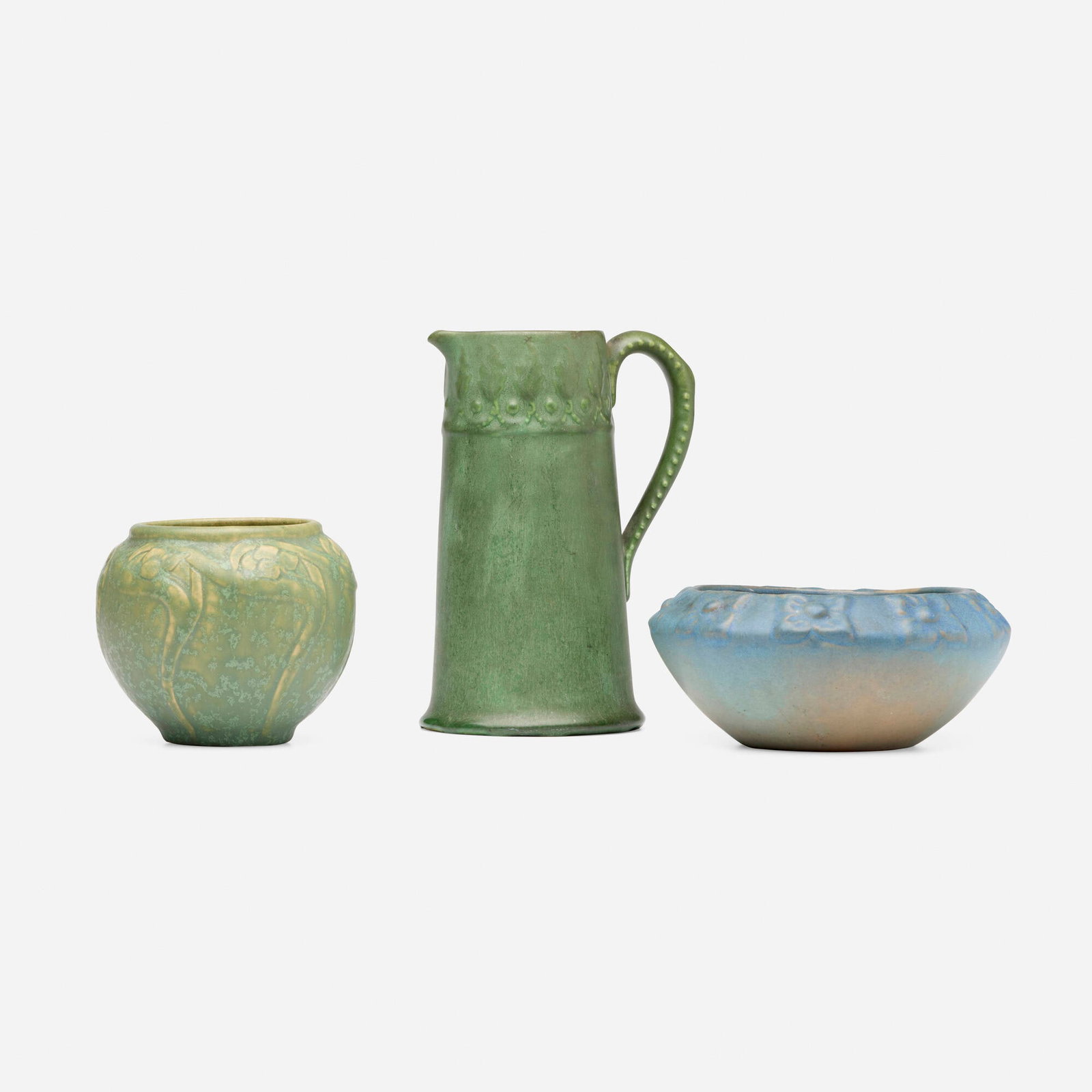 Van Briggle Pottery and Hampshire Pottery, Collection of three works: Van Briggle Pottery and Hampshire Pottery Collection of three works USA, c. 1885, c. 1907, 1919 glazed earthenware 7.5 h x 5.25 w x 4.25 d in (19 x 13 x 11 cm) 4 h x 4.625 dia in (10 x 12 cm) 2.75 h