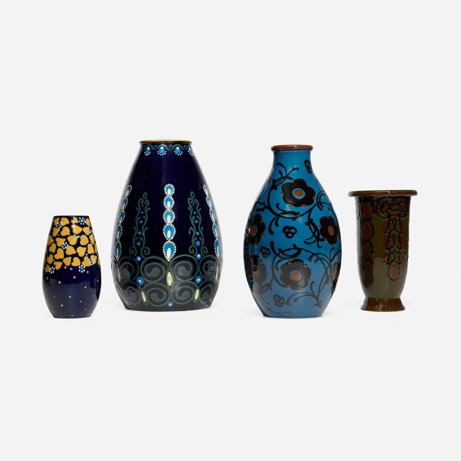 Max Laeuger for Karlsruher Majolika, Collection of four vases: Max Laeuger for Karlsruher Majolika Collection of four vases Germany, c. 1925 glazed earthenware with squeeze-bag decoration largest: 12.5 h x 8.5 dia in (32 x 22 cm) smallest: 7 h x 4 dia in (18 x