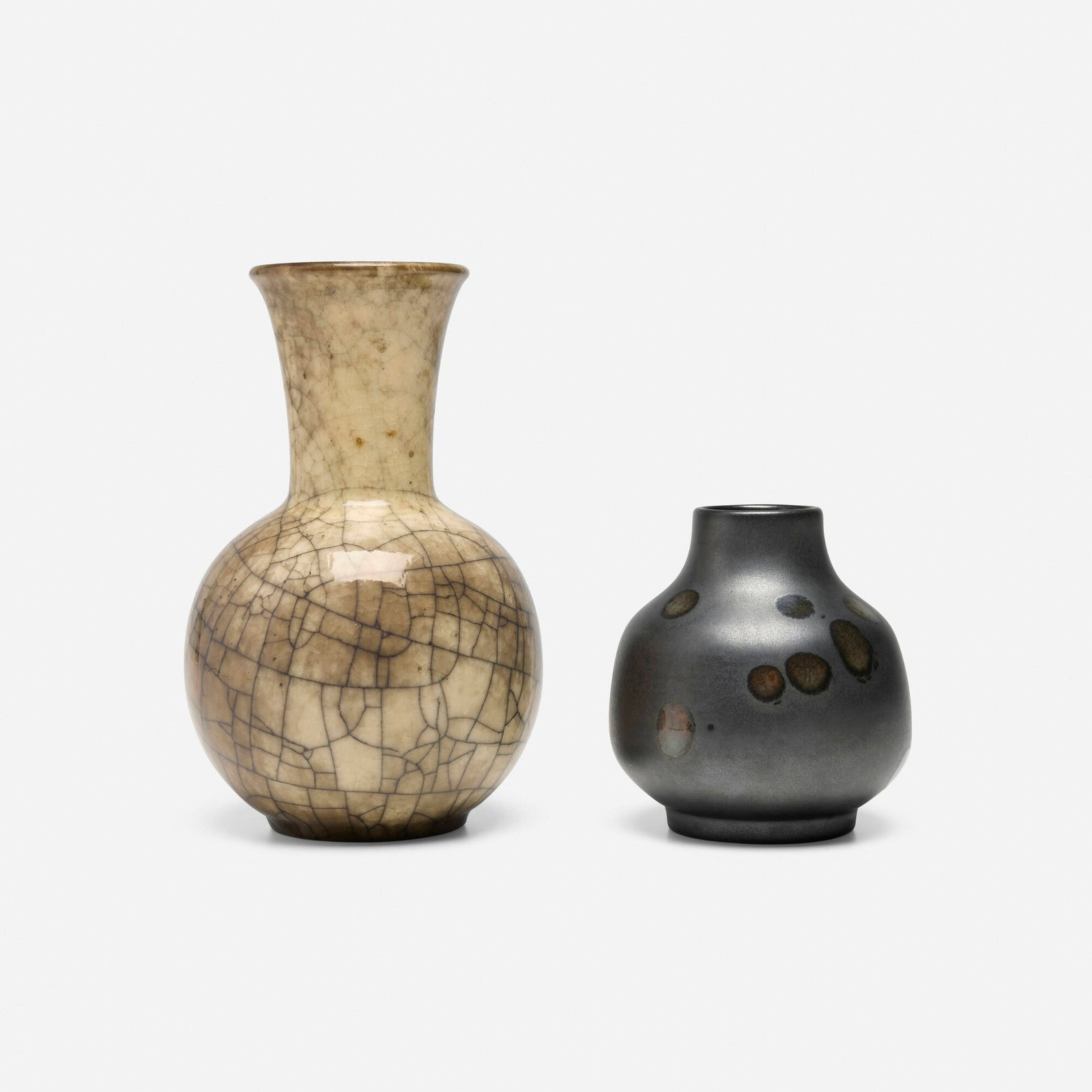 Karlsruher Majolika, Vases, set of two: Karlsruher Majolika Vases, set of two Germany, c. 1930 glazed earthenware 9.75 h x 5.75 dia in (25 x 15 cm) 5.5 h x 5 dia in (14 x 13 cm) Impressed or cast manufacturer's mark and numbers to