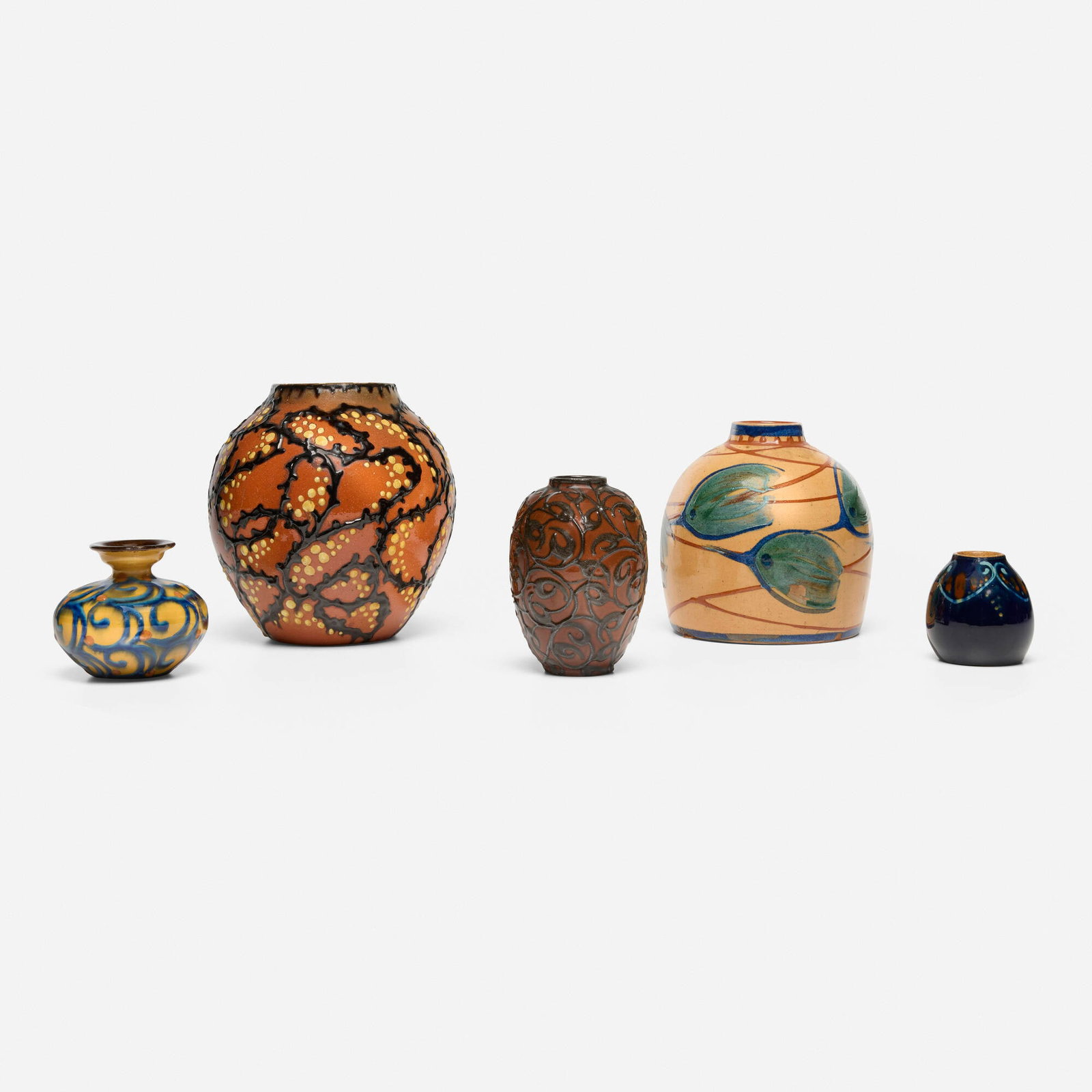 Various Makers, Collection of five vases: Various Makers Collection of five vases c. 1910-1925 glazed earthenware with squeeze-bag decoration largest: 7 h x 7 dia in (18 x 18 cm) smallest: 2.75 h x 2.75 dia in (7 x 7 cm) Collection includes