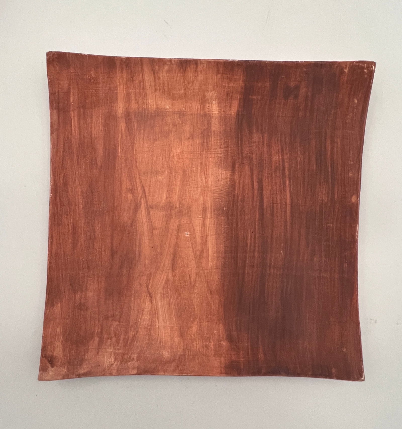 Toshiko Takaezu plate: Wood Grain earthware plate, matte two tone brown color, signed on the back