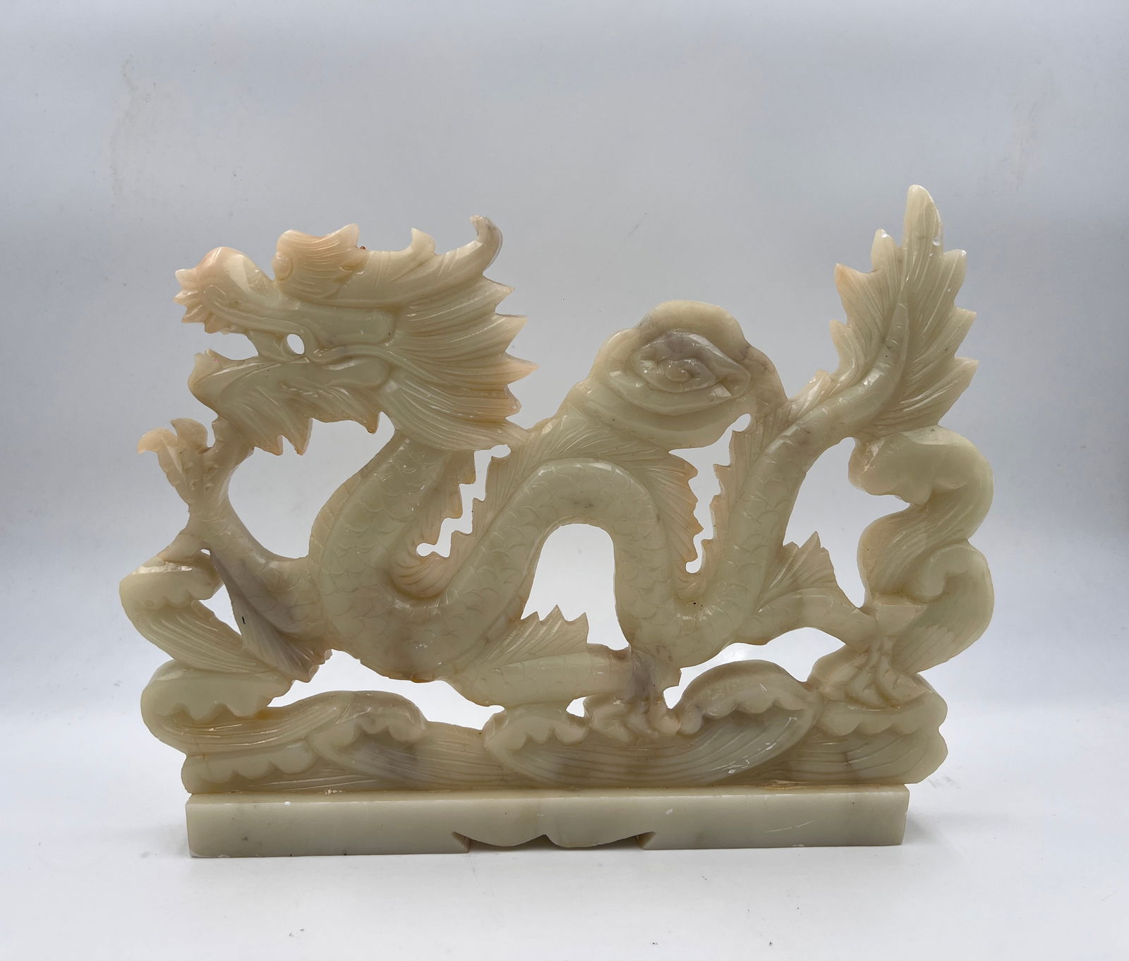 Chinese Jade dragon sculpture (two sided): Chinese dragon sculpture made out of Mutton Fat Jade (creamy white nephrite).