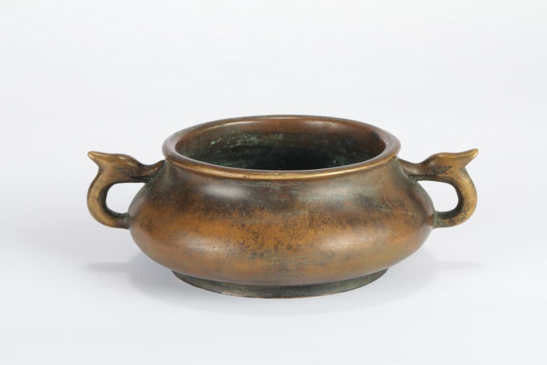 China, Two Dragon Ears Burner: This item has a round mouth, bulb belly.There are two symmetrical dragon shape ears on both sides, abdominal wall is smooth element without grain act the role . The body is thick and the shape is regu
