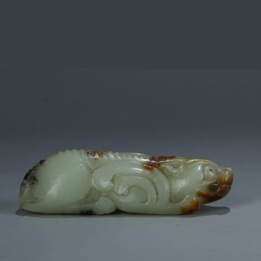 CARVED CELADON JADE FOO DOG ORNAMENT: Dimension: W 7.5cm D 2.5cm