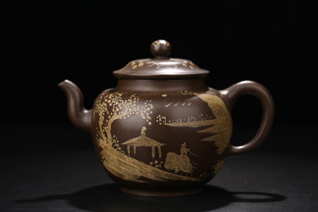 A CHINESE 'LANDSCAPE' ZISHA TEAPOT: Dimension: H 13 cm, Rim Diam 7.7 cm, L 19.5 cm, Weight 440 g