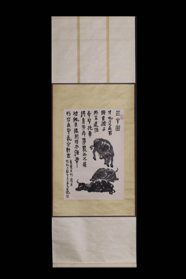 CHINESE PAINTING OF BUFFALO AND CALLIGRAPHY: CHINESE PAINTING OF BUFFALO AND CALLIGRAPHY signed after Li Keran Dimension: Inner Painting: 66.5 cm x 44.5 cm Full Scroll: 184 cm x 61.5 cm Ink on paper, Hanging Scroll
