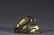 A CHINESE GOLD INLAID COPPER 'TIGER' PAPERWEIGHT