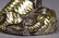 A CHINESE GOLD INLAID COPPER 'TIGER' PAPERWEIGHT - 7