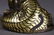 A CHINESE GOLD INLAID COPPER 'TIGER' PAPERWEIGHT - 8