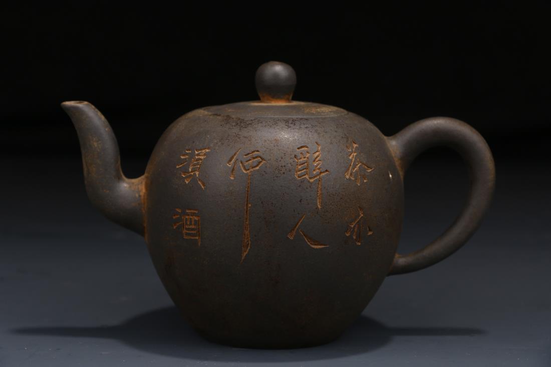 A CHINESE POEM ENGRAVED ZISHA TEAPOT: Dimension: Rim Diam 5 cm, Base Diam 5 cm, H 10.5 cm, Weight: 230 g