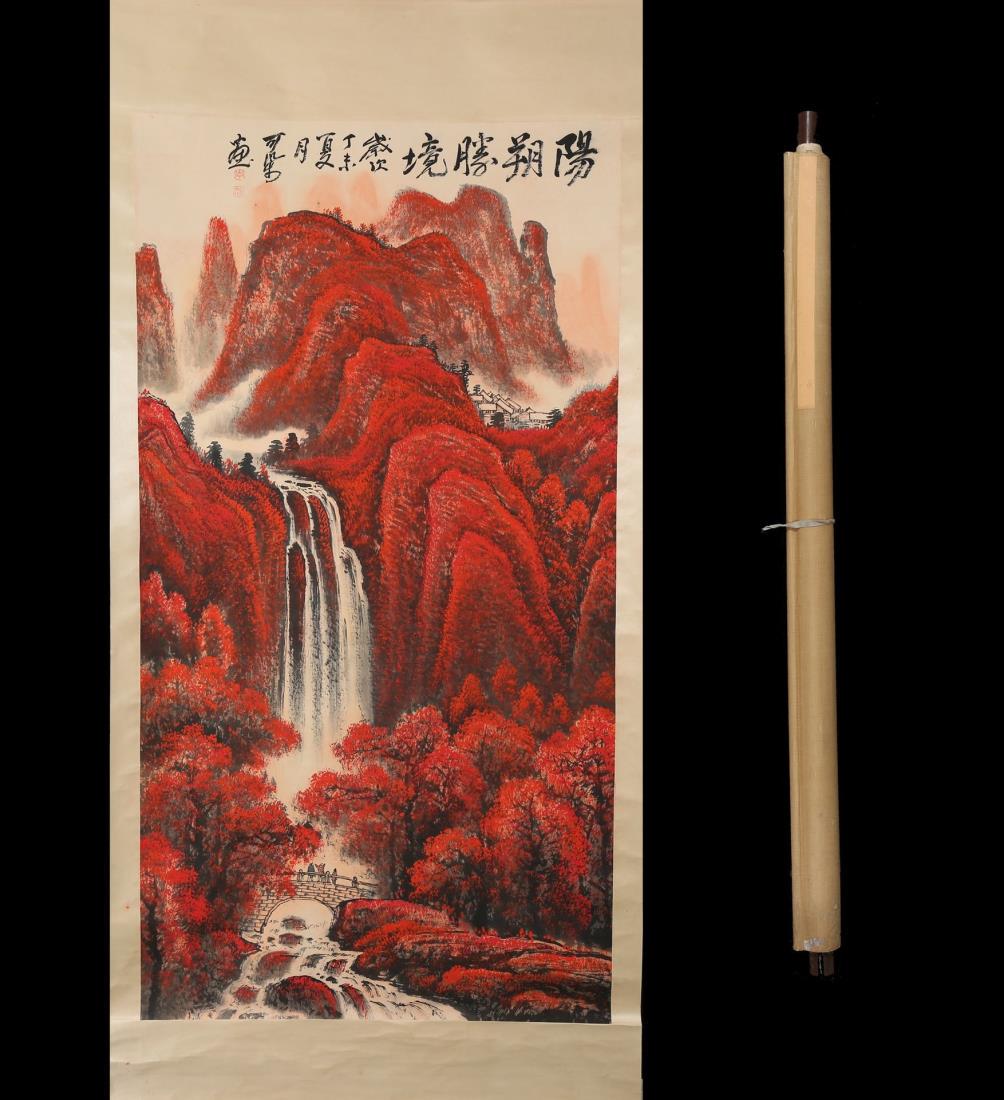 A PAINTING OF RED MOUNTAIN, LI KERAN: A painting of red mountain by Li keran Ink and color on paper, Hanging Scroll. Artist signature and seals. Dimensions: Inner Painting: 94 cm x 178 cm. All measurements are approximate.
